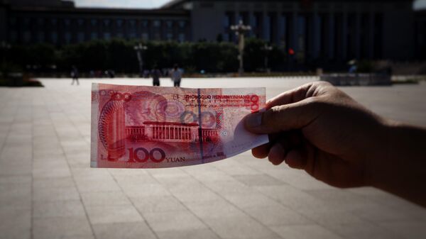 Un billete de 100 yuanes. Imagen referencia. - Sputnik Mundo