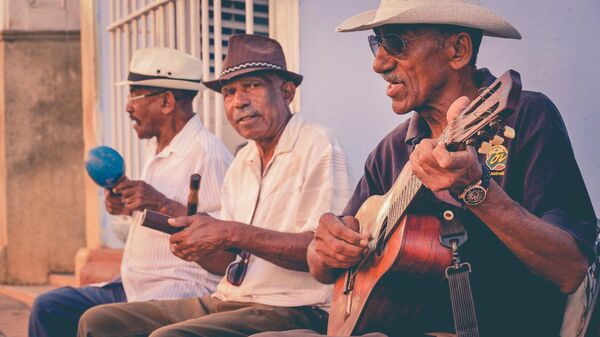 Tres músicos cubanos - Sputnik Mundo