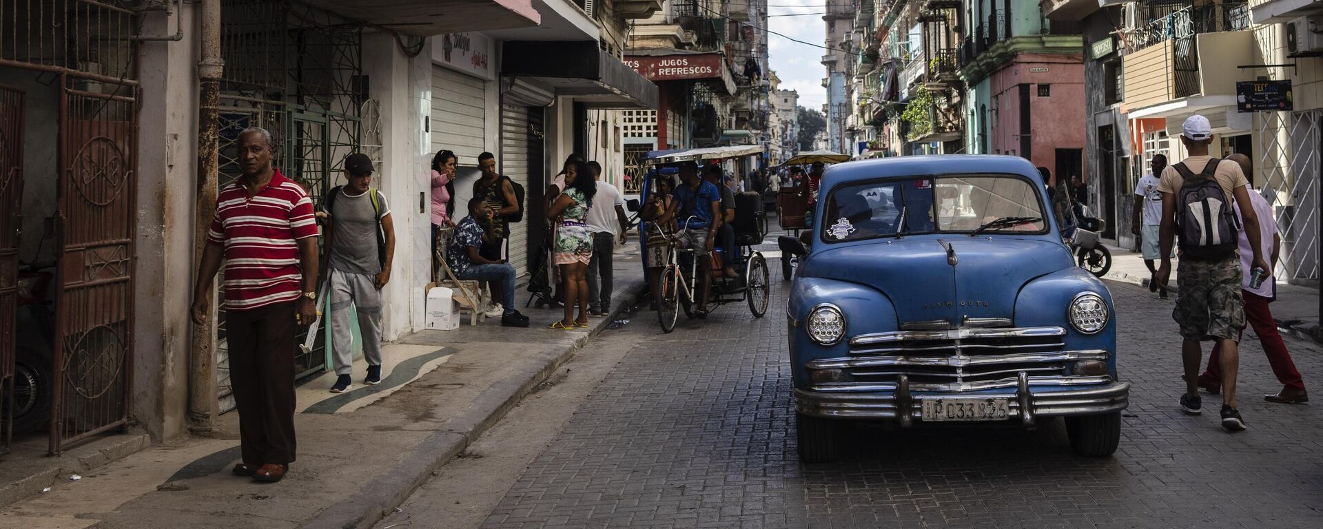 Locales comerciales en una calle de La Habana, Cuba - Sputnik Mundo, 1920, 01.01.2024