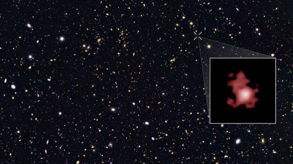 Una imagen de la galaxia GN-z11, tomada por el telescopio espacial Hubble - Sputnik Mundo