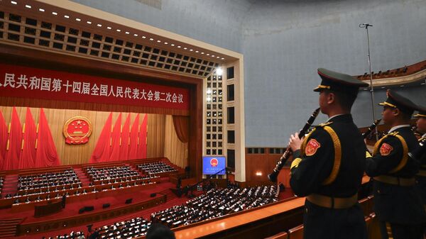 La banda del Ejército Popular de Liberación de China actúa durante la sesión inaugural del Asamblea Nacional Popular en el Gran Salón del Pueblo de Pekín, el 5 de marzo de 2024. - Sputnik Mundo