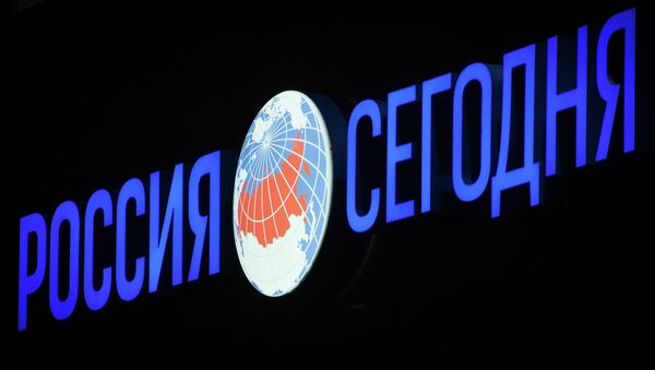 Logo de Rossiya Segodnya - Sputnik Mundo