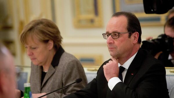 Canciller de Alemania, Angela Merkel y presidente de Francia, François Hollande - Sputnik Mundo