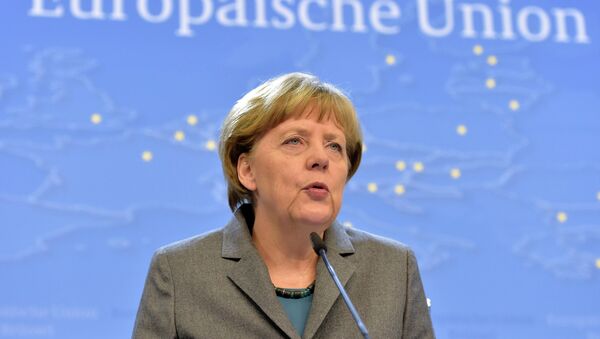 Germany's Chancellor Angela Merkel addresses a news conference after an European Union leaders summit in Brussels February 12, 2015. - Sputnik Mundo