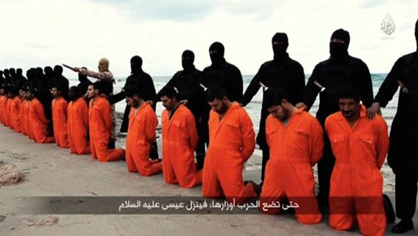 Men in orange jumpsuits purported to be Egyptian Christians held captive by the Islamic State - Sputnik Mundo