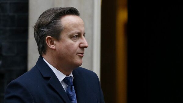 Britain's Prime Minister David Cameron leaves Downing Street - Sputnik Mundo