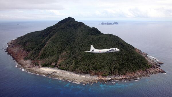 Una de las islas Senkaku (Diaoyu) - Sputnik Mundo