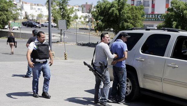 Miembros de policía mexicana en Jalisco - Sputnik Mundo