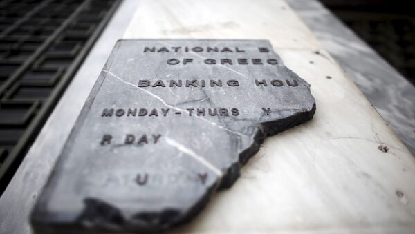 A damaged sign of National Bank of Greece - Sputnik Mundo