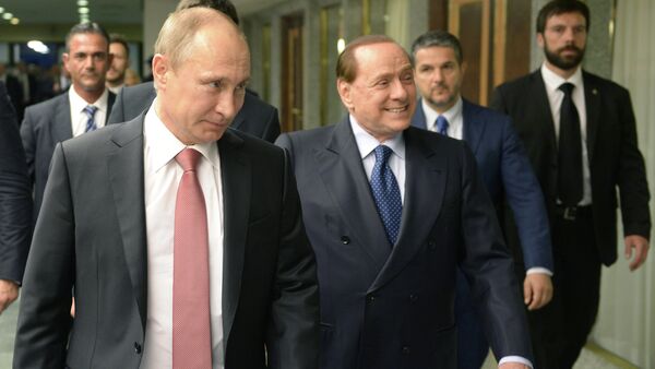 Russian President Vladimir Putin, left, and former Italian prime minister Silvio Berlusconi at their meeting in Rome, June 10, 2015 - Sputnik Mundo