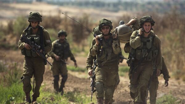 Soldados israelíes al lado de la frontera de la Franja de Gaza (archivo) - Sputnik Mundo