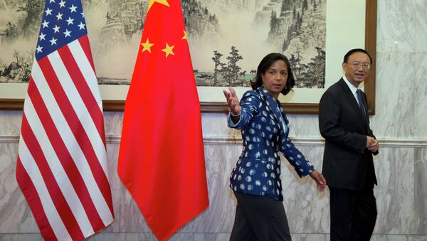 Consejera de seguridad nacional del presidente Obama, Susan Rice y miembro del Consejo de Estado chino, Yang Jiechi (Archivo) - Sputnik Mundo