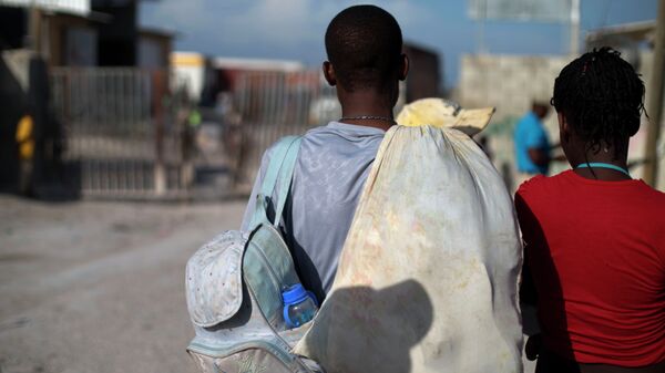 Migrantes haitianos - Sputnik Mundo