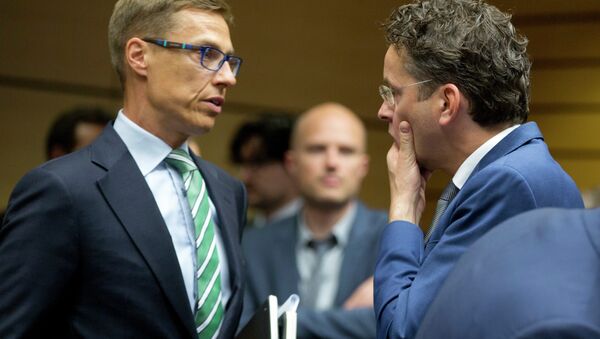 El ministro de Finanzas de Finlandia, Alexander Stubb (izquierda) y el presidente del Eurogrupo, Jeroen Dijsselbloem - Sputnik Mundo