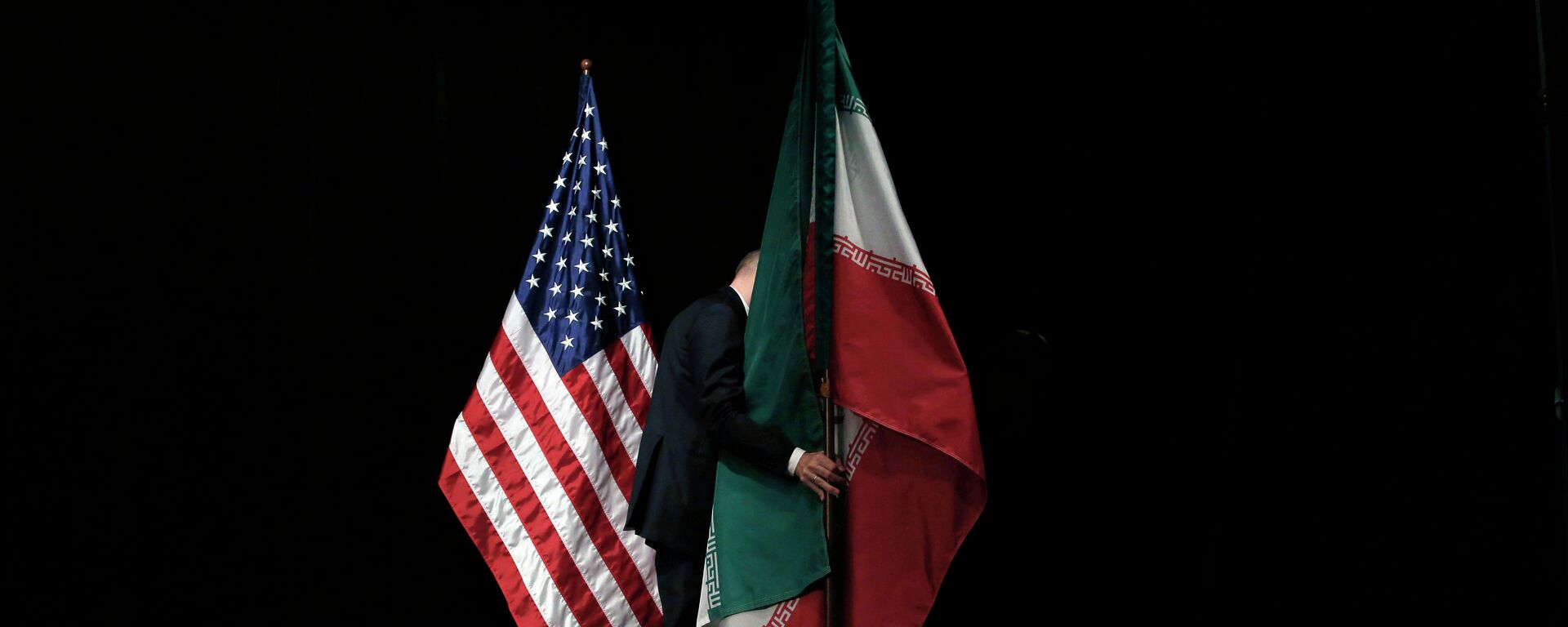Banderas de EEUU e Irán - Sputnik Mundo, 1920, 18.02.2021