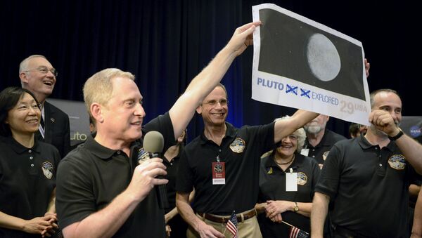 NASA celebra el acercamiento de la sonda New Horizons a Plutón, el 14 de julio, 2015 - Sputnik Mundo