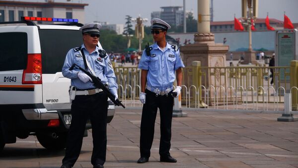 Policías chinos - Sputnik Mundo