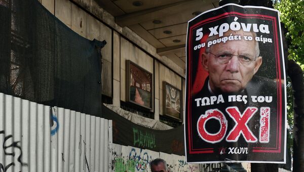 Póster con la imágen de Wolfgang Schäuble en Atenas - Sputnik Mundo