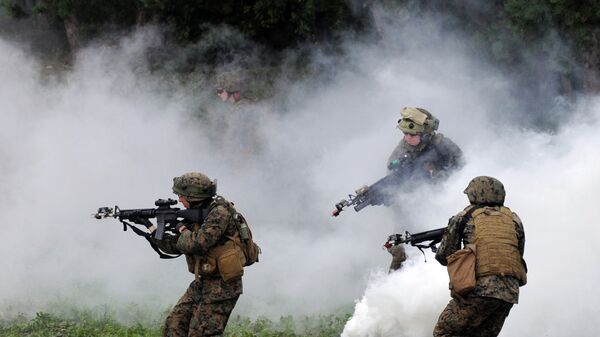 Soldados estadounidenses durante los ejercicios en Ucrania - Sputnik Mundo