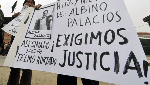 Familiares de víctimas de masacre de Accomarca durante una manifestación - Sputnik Mundo