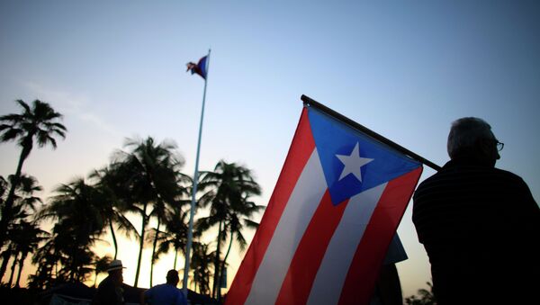 Puerto Rico se dirige a un duro plan de recortes y privatizaciones - Sputnik Mundo