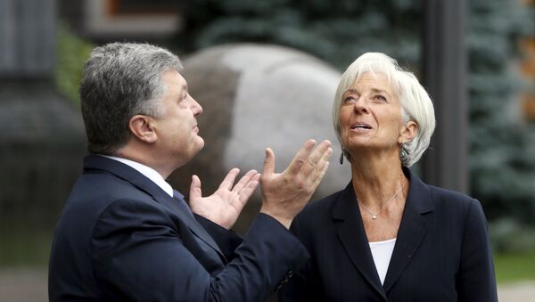 Presidente de Ucrania, Petró Poroshenko y directora del FMI, Christine Lagarde (Archivo) - Sputnik Mundo