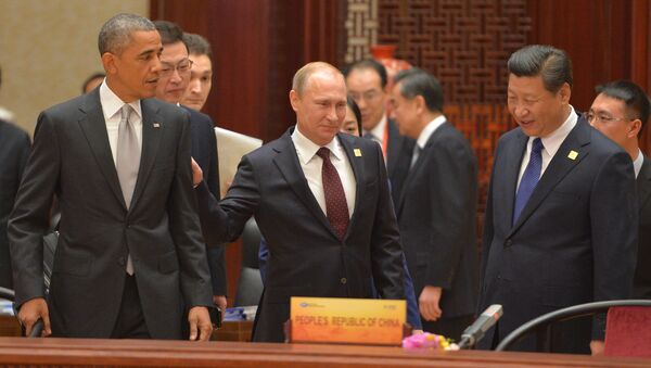 Vladímir Putin, el presidente de Rusia con sus homólogos de EEUU y China - Sputnik Mundo