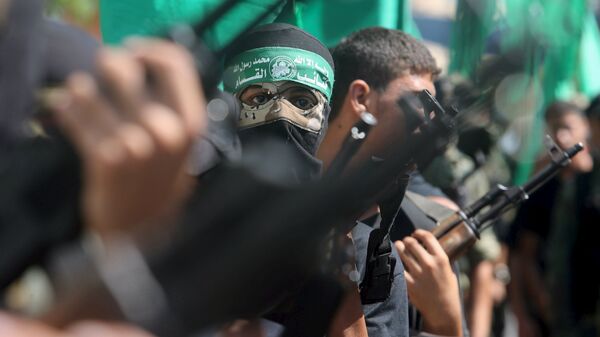 Unos militantes de Hamás  - Sputnik Mundo