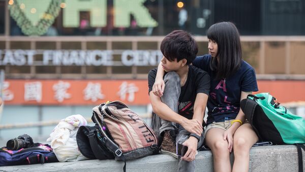 Una pareja en Hong Kong - Sputnik Mundo