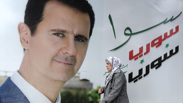 Póster de presiente de Siria, Bashar Asad en Damasco - Sputnik Mundo