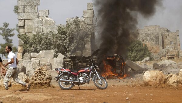 Consecuencias de los ataques aéreos rusos (según activistas) en Idlib, Siria - Sputnik Mundo