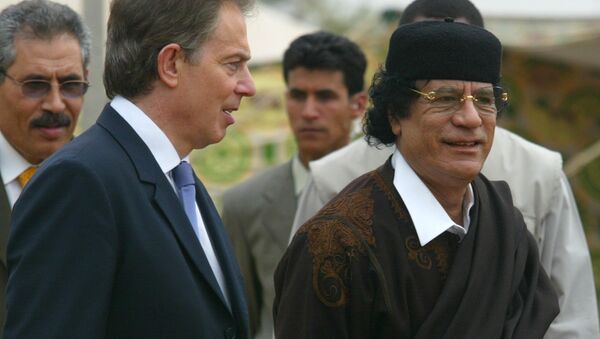 Ex primer ministro del Reino Unido, Tony Blair, y ex líder de Libia, Muammar Gadafi - Sputnik Mundo