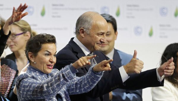 Responsable de cambio climático de la ONU, Christiana Figueres, y ministro de Asuntos de Exteriores de Francia, Laurent Fabius - Sputnik Mundo