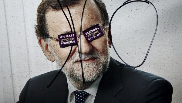 Un cartel electoral con la imagen de Mariano Rajoy en Madrid - Sputnik Mundo