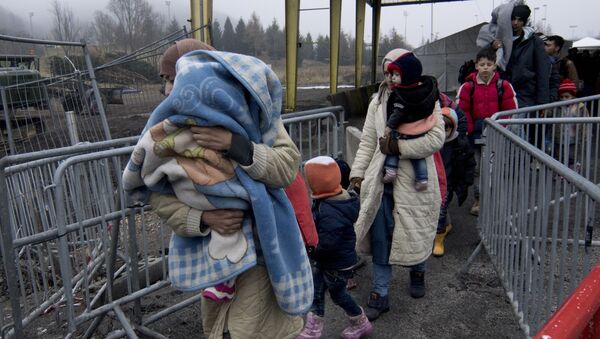 Refugiados en la frontera entre Austria y Slovenia - Sputnik Mundo