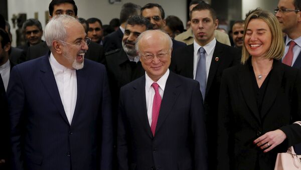 Ministro de Exteriores de Irán, Javad Zarif, director general del OEIA, Yukiya Amano, y alta representante para Asuntos Exteriores de UE, Federica Mogherini - Sputnik Mundo