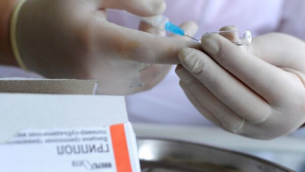 Una vacuna rusa contra la gripe (Archivo) - Sputnik Mundo