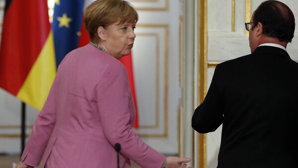 Canciller de Alemania, Angela Merkel y presidente de Francia, François Hollande - Sputnik Mundo