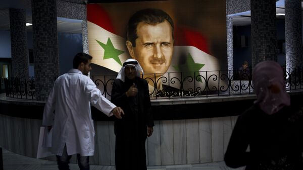 Retrato de Bashar Asad, presidente de Siria, en el Hospitál de Damasco (archivo) - Sputnik Mundo