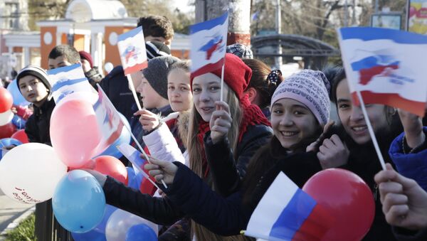 La celebración del 2 aniversario de la adhesión de Crimea a Rusia en marzo de 2016 - Sputnik Mundo