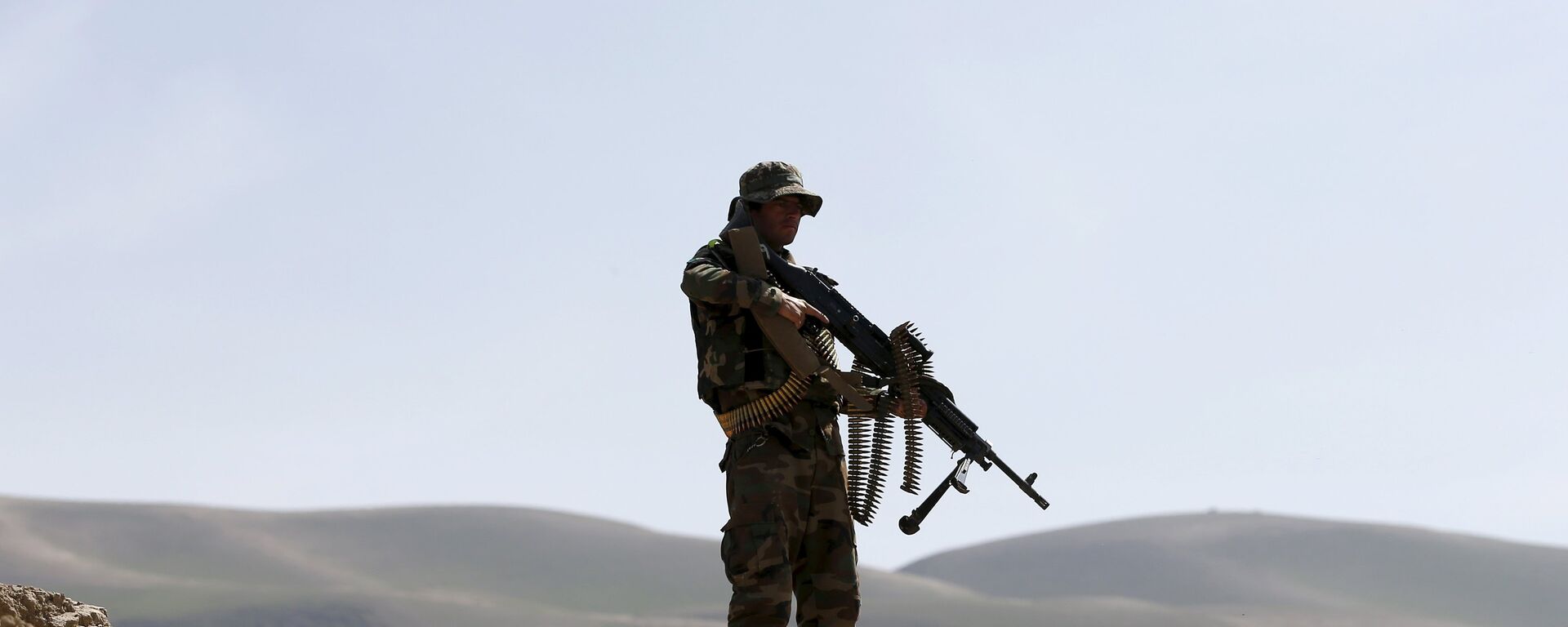 El soldado del Ejército afgano patrulla Dand Ghori, el distrito de Baglan - Sputnik Mundo, 1920, 05.08.2021