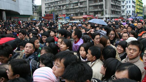 La muchedumbre en la estación ferroviaria de Guangzhou - Sputnik Mundo