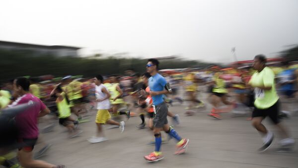 Maratón en China (archivo) - Sputnik Mundo