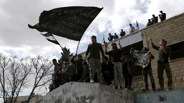Militantes con banderas extremistas, Idlib, Siria (archivo) - Sputnik Mundo