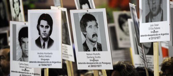 Thousands of Uruguayans take part in the 20th March of Silence --the most well-attended so far-- in memory of missing people during the military dictatorship (1973-1985), in Montevideo on May 20, 2015. Thousands of Uruguayans take part in the 20th March of Silence --the most well-attended so far-- in memory of missing people during the military dictatorship (1973-1985), in Montevideo on May 20, 2015. - Sputnik Mundo