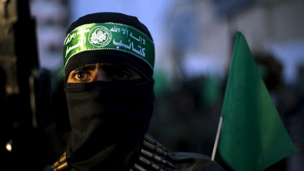 Militante del movimiento Hamás - Sputnik Mundo