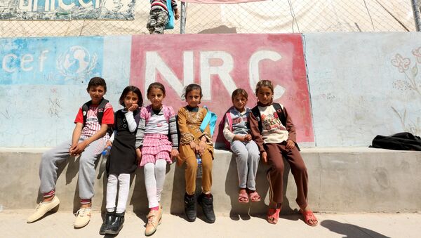 Los niños yazidíes de Sinjar en un campo de refugiados en Irak - Sputnik Mundo