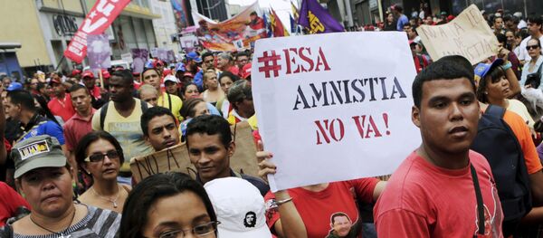 Protesta contra ley de amnistía en Caracas Protesta contra ley de amnistía en Caracas - Sputnik Mundo