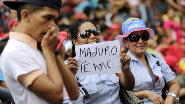 Seguidores de Nicolás Maduro, el presidente de Venezuela - Sputnik Mundo