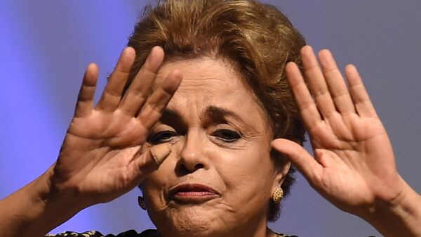 Brazilian President Dilma Rousseff gestures during the opening ceremony of the 4th National Policy Conference on Women in Brasilia on May 10, 2016 - Sputnik Mundo